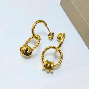 Elegant 18K gold plated twisted stainless steel hoop earrings with chic interlocking rings.
