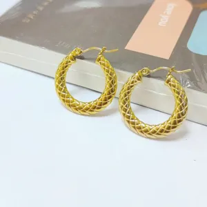 Gold stainless steel hoop earrings with textured grid design, chic European American style jewelry.