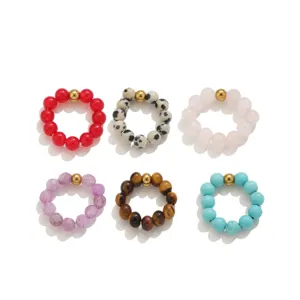 Detailed view of colorful natural stone beaded rings set, showcasing exquisite gem textures.