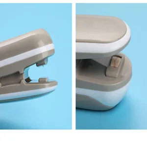 Portable mini plastic bag sealer detail view showing the heating element and cutter roller.