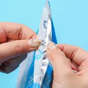 Portable mini heat sealing machine for household plastic food bags, convenient sealer.