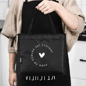 Insulated lunch bag for office school, portable black thermal food storage tote bag.