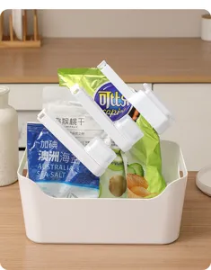 Plastic food bag sealing clips with pour spout storage container detail view kitchen use