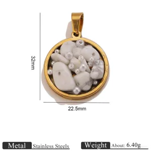 Stainless steel round pendant detail, featuring natural crushed stones and pearls in epoxy resin.