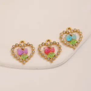 Stainless steel heart tulip pendant detail, rhinestone enamel DIY jewelry accessory.