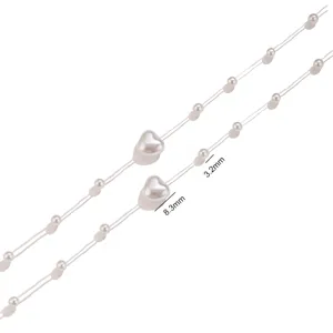 Gros plan détaillé d'accessoires de chaîne de perles en forme de cœur avec dimensions précises.