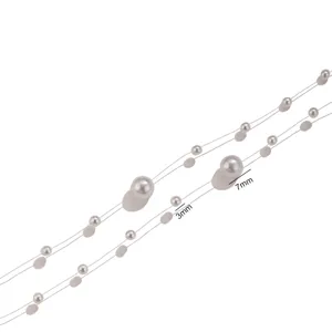 Chaîne de perles accessoires de bijoux avec perles de 3mm et 7mm sur fil transparent.