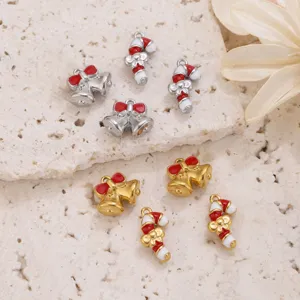 Stainless steel Christmas enamel bell candy cane pendants for DIY jewelry making crafts detail.