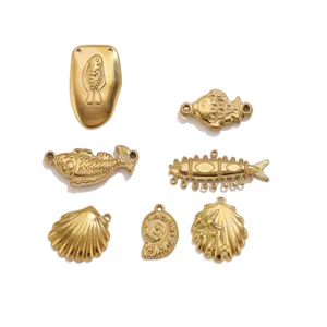 Stainless steel 18k gold plated ocean style fish and shell charms DIY jewelry making accessories.