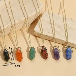 Natural crystal hexagonal column necklace with double-pointed stone pendant and delicate gold chain.