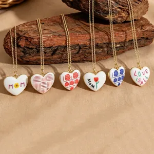Fashion European and American style heart pendant necklace set with colorful enamel designs.