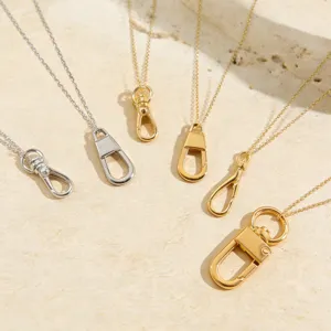 Metal keychain pendant necklace set featuring stylish lobster claw clasps in gold and silver.