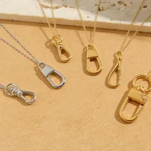 Detailed view of fashionable metal keychain pendant necklaces in gold and silver finishes.