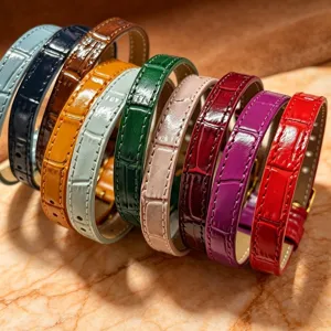 Closeup of colorful crocodile pattern leather wrap bracelets, multi-color fashion DIY accessories.