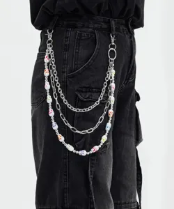 Three layer skull pants chain detail, stylish hip-hop waist chain for women streetwear.