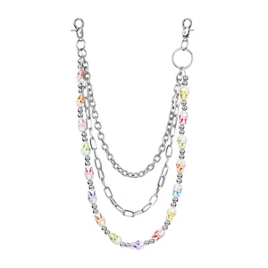 Detailed close-up view of a multi-layered hip-hop pants chain featuring colorful skull beads.