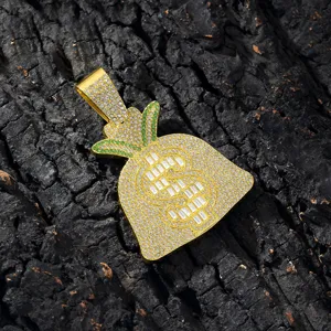Close-up of a dazzling gold money bag pendant, sparkling crystal hip-hop jewelry detail.