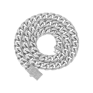 Close-up detail of silver Cuban link chain with rhinestone pave box clasp hip hop style