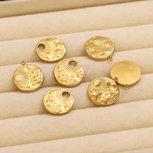 Close-up detail of stainless steel sun moon stars gold charms for DIY jewelry accessories.