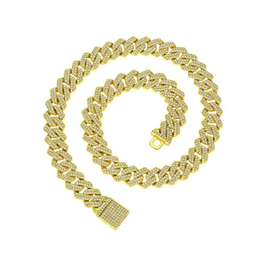 Detailed shot of a 14mm gold iced out Cuban link chain necklace with secure box clasp.