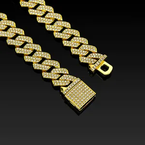 Detailed view of the 14mm Iced Out Cuban Link Chain featuring a classic flip clasp in light gold finish.