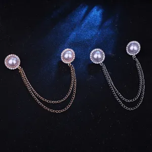 Close-up detail of Korean style pearl rhinestone alloy chain collar pins shirt brooches