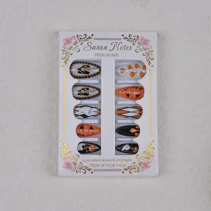 Halloween press on nails detail view featuring cute ghost and pumpkin 3d sticker designs.