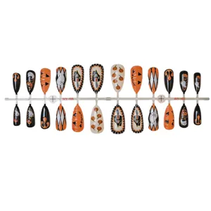 24pcs Halloween press-on nails set with cute pumpkin and ghost art, fake nail tips.
