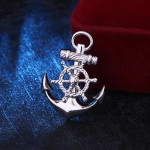 Detailed view of silver marine anchor and ship wheel brooch, stylish navy academy pin design.