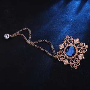 Vintage hohle Metall Brosche mit blauem Edelstein Strass Quette Kette fuer Mantel und Jacke