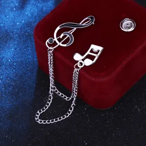 Stylish musical note brooch with tassel chain, perfect for men and women suit collar pins.