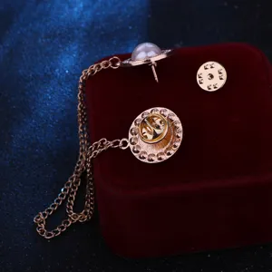 Elegant rose gold chain collar pin with pearl and rhinestones for stylish women's shirts.