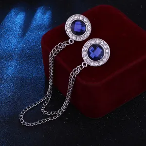 Close-up detail of double rhinestone collar pin with chain accessory shirt jewelry