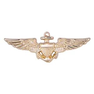 Golden metal pilot wings badge, military anchor and shield brooch for uniform apparel accessories.