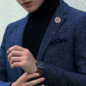 Exquisite men's rhinestone steering wheel brooch pin for suit jacket and apparel decoration.