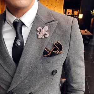 Men's luxury rhinestone crystal fleur-de-lis brooch pin for suit jacket fashion accessory.