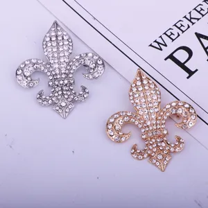 Silver and gold rhinestone encrusted fleur de lis brooch pins elegant suit fashion accessories