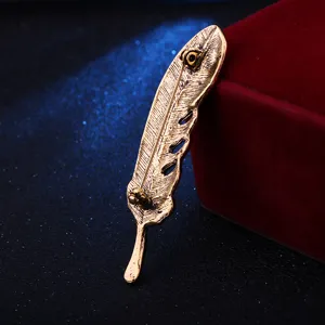 Vintage gold feather brooch lapel pin for men, retro leaf jacket accessory fashion jewelry.