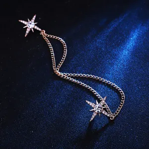 Exquisite rhinestone starburst collar pin detail, elegant double star tassel chain brooch for shirts.