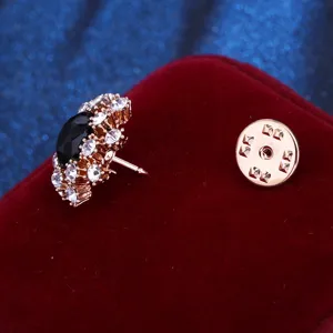 Crystal rhinestone lapel pin detail view, elegant black stone brooch for suit or dress.