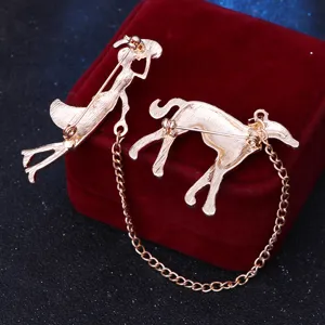 Gold-plated woman walking dog brooch pin set, stylish metal animal apparel accessory for women.