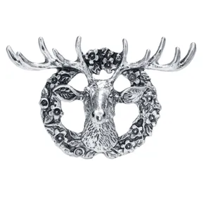Vintage silver deer head brooch detail, retro elk lapel pin for suit jacket accessory.