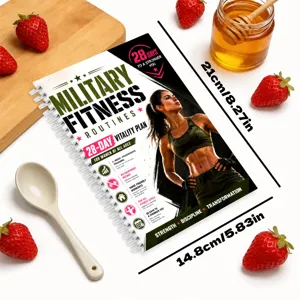 Detailed close-up view of the 28-day women fitness routine spiral notebook and props.
