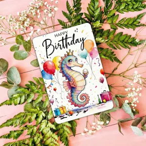 Detailed close-up of cute watercolor seahorse birthday greeting card with balloons.