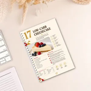 Detailed view of low-carb cheesecake recipe notebook page with clear ingredients and steps.