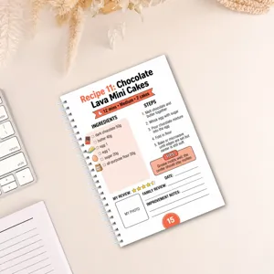 Page de carnet de recettes en spirale montrant les details et etapes du gateau chocolat.