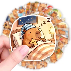 Cute capybara sleeping sticker, waterproof PVC vinyl decal for phone case and journal decor.