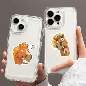 Detail view of transparent phone cases featuring funny cartoon horse stickers, clear design.
