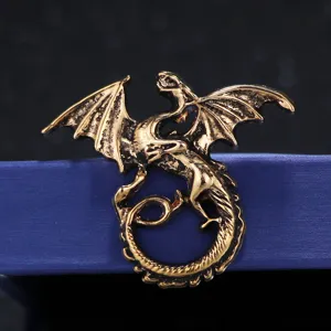 Vintage dragon brooch detail, retro gold tone alloy lapel pin for women and men style.