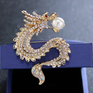 Exquisite rhinestone dragon brooch with pearl accent, elegant gold suit pin for men and women.